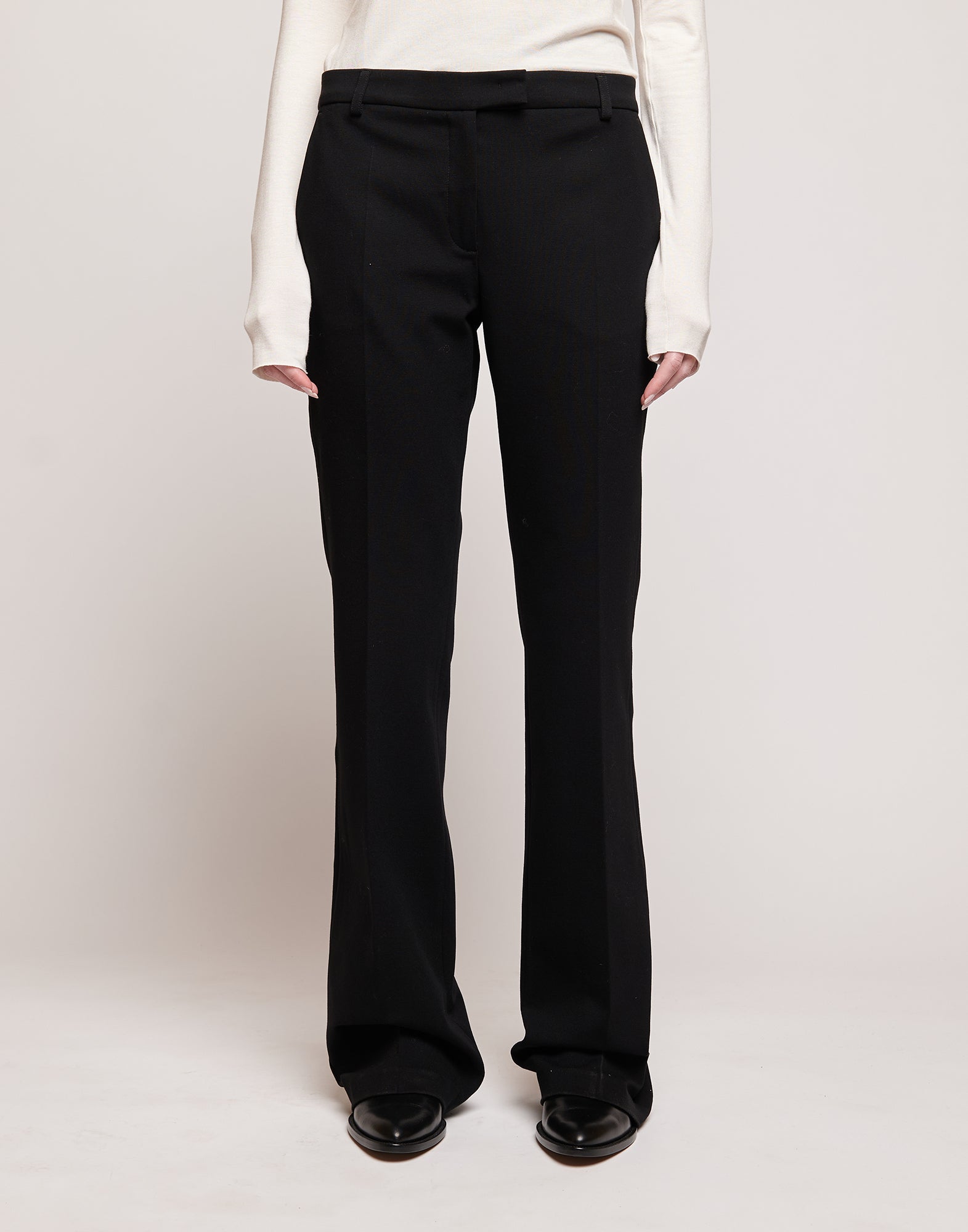 Pantaloni Flare in Punto Milano con Piega Neri