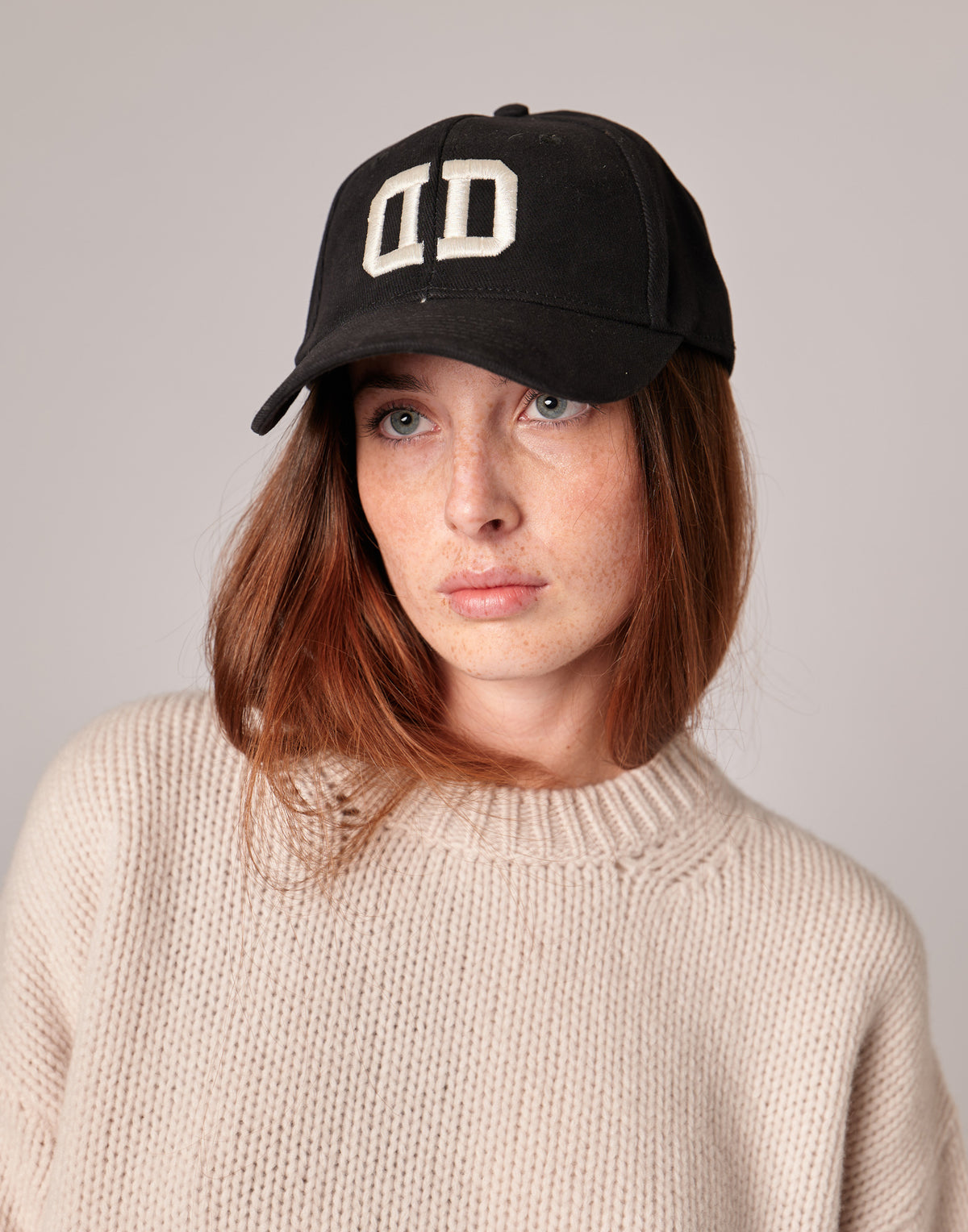 Black Baseball Cap with White Embroidered DD Logo